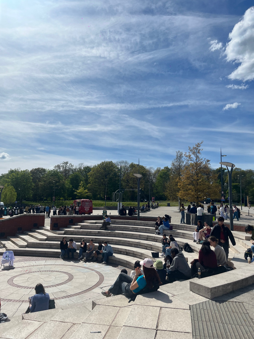 Students passing through the University of Warwick's campus
